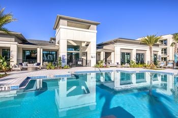 Resort style pool with tanning ledge & sundeck